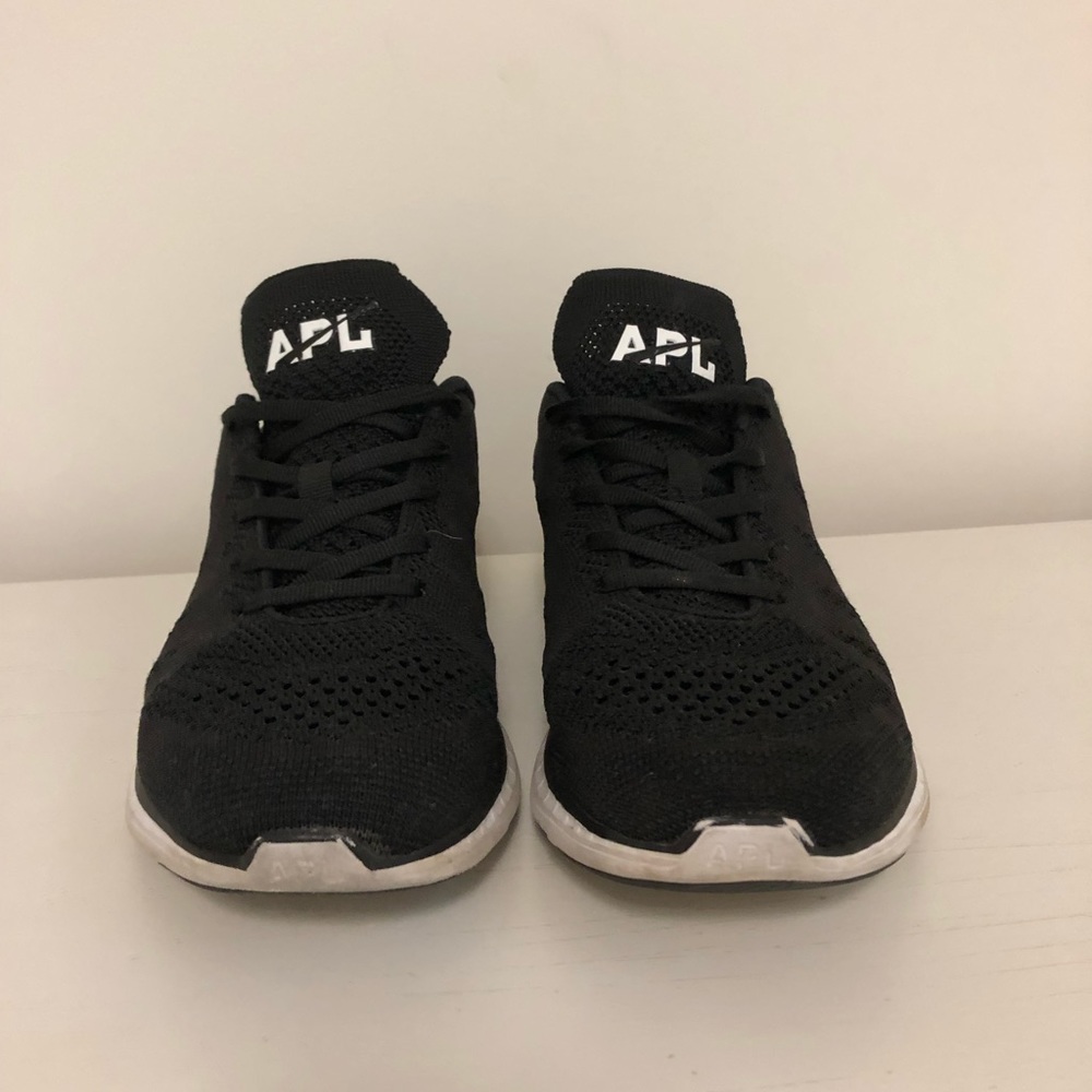 Black APL running sneakers